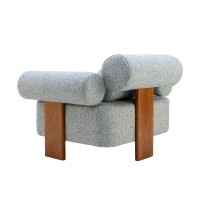 Poltrona Annalya contemporânea com design escultural em madeira de eucalipto e volumes cilíndricos estofados. Uma peça de presença arquitetônica criada para salas de estar sofisticadas, lounges modernos e ambientes de alto padrão que valorizam conforto, e