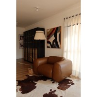 Poltrona Ondine em Couro Legítimo Estofado Orgânico com Costuras Decorativas